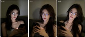 戴眼镜御姐沙发玩手机